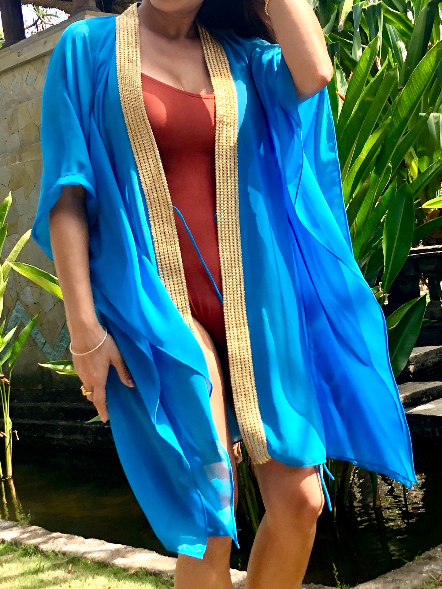 Bold blue beach kaftan for women looking for best beach kaftans in dubai for resort holidays