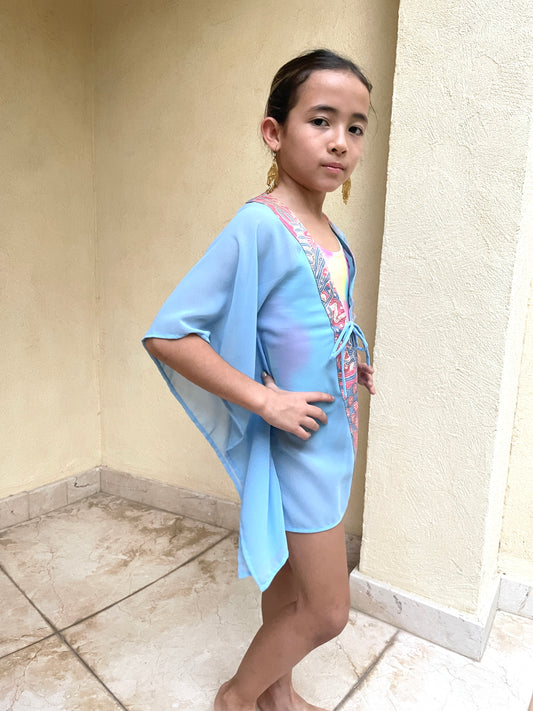Ethically made girls' beach kaftan, sustainably crafted in Bali with hand-stamped batik and powder blue chiffon