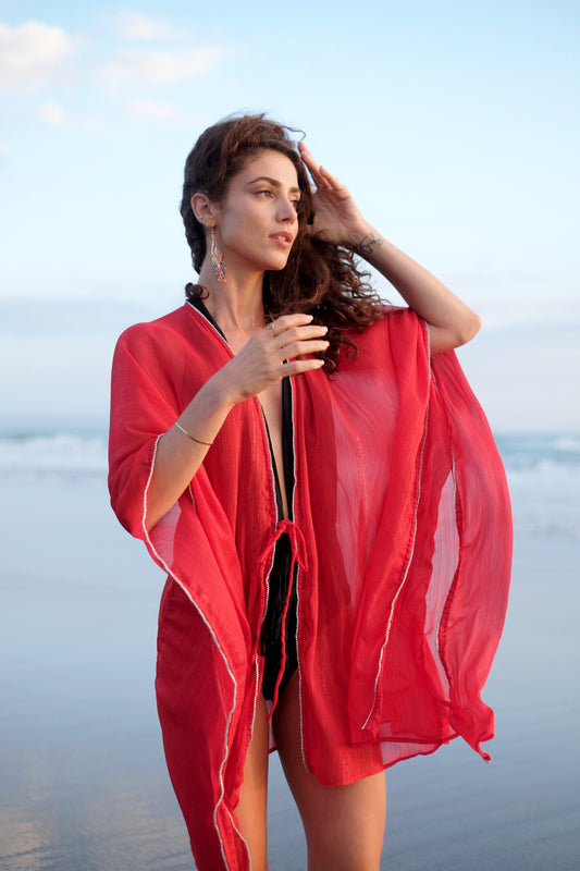 A boho glamorous beach kaftan in red lurex chiffon with rhinestoned trimmed necklines & sleeves, for glamorous pool parties & beach days, as well as nights on the town, designed in Dubai, sustainably made in Bali