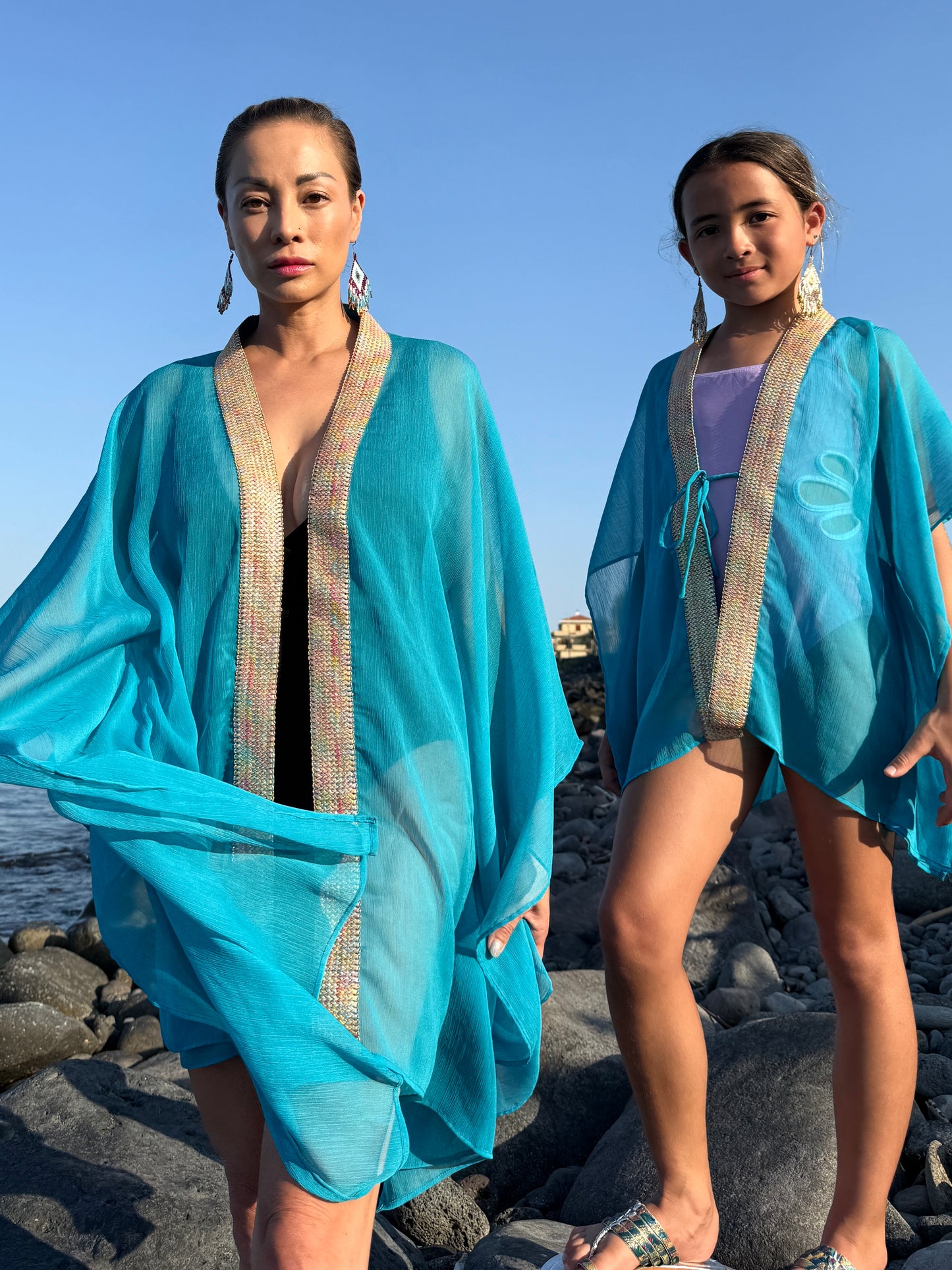 Women and girls teal chiffon beach kaftans, sustainable resort wear in Dubai