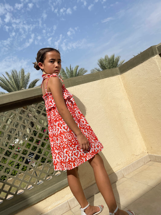 rory girls orange ikat batik dress handmade in Indonesian cotton summer dress for kids dubai