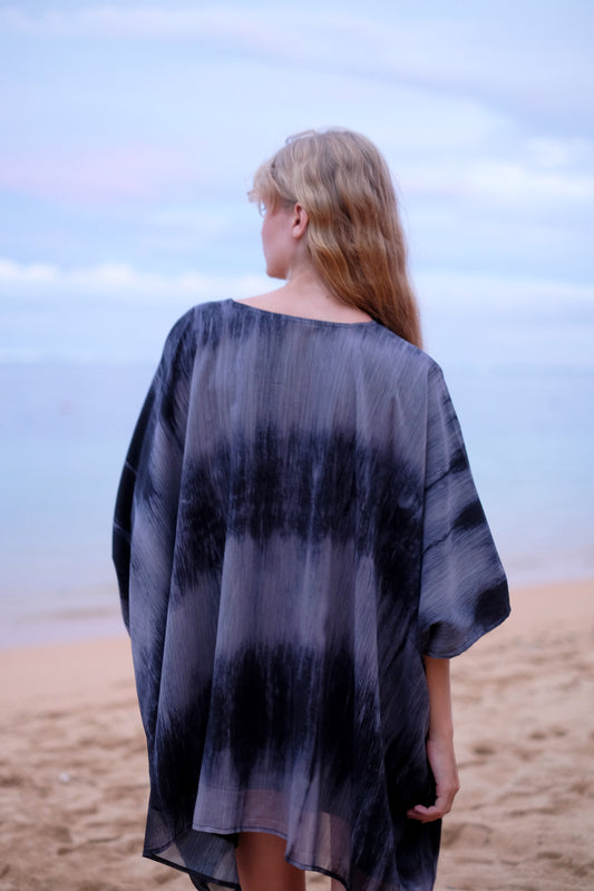 Back view of versatile navy Seraphina chiffon kaftan, perfect casual resort wear in Dubai, sustainably made in Bali