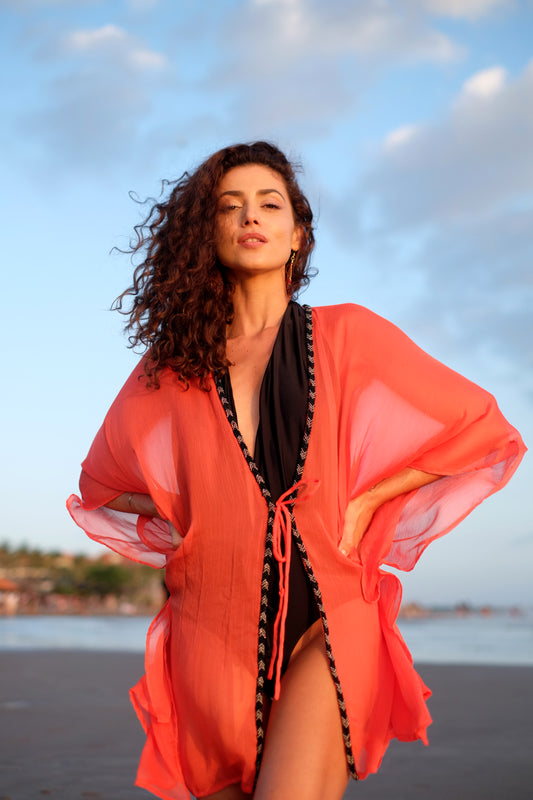 Glamorous and breezy orange ladies beach kaftan for poolside lounging in Dubai and beyond