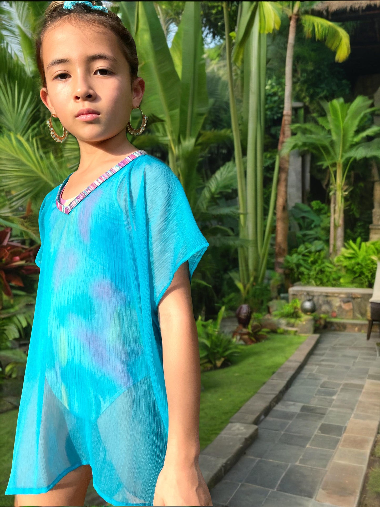 Stylish teal Anisa kaftan for girls, perfect for Dubai beaches and holidays, eco-friendly kids beach fashion made in Bali for kids in Dubai
