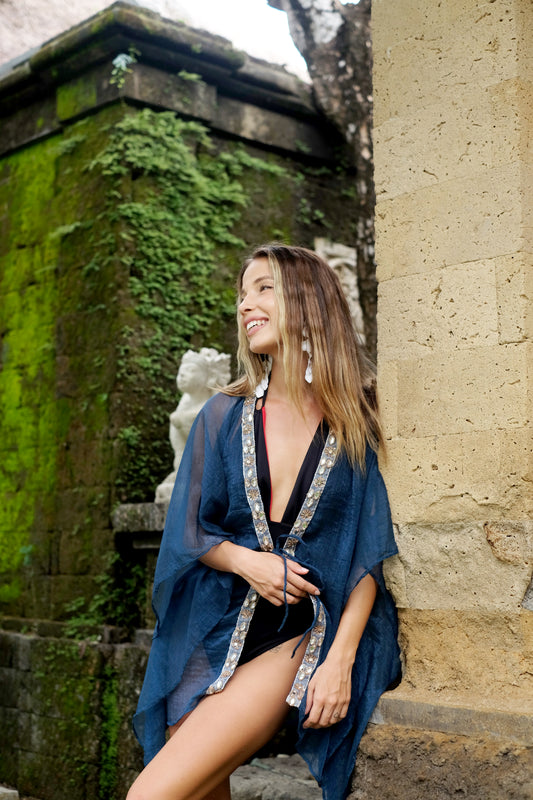 Ciana teal beach kaftan with rose gold beaded neckline trim, sustainable beachwear made in Bali for women in Dubai