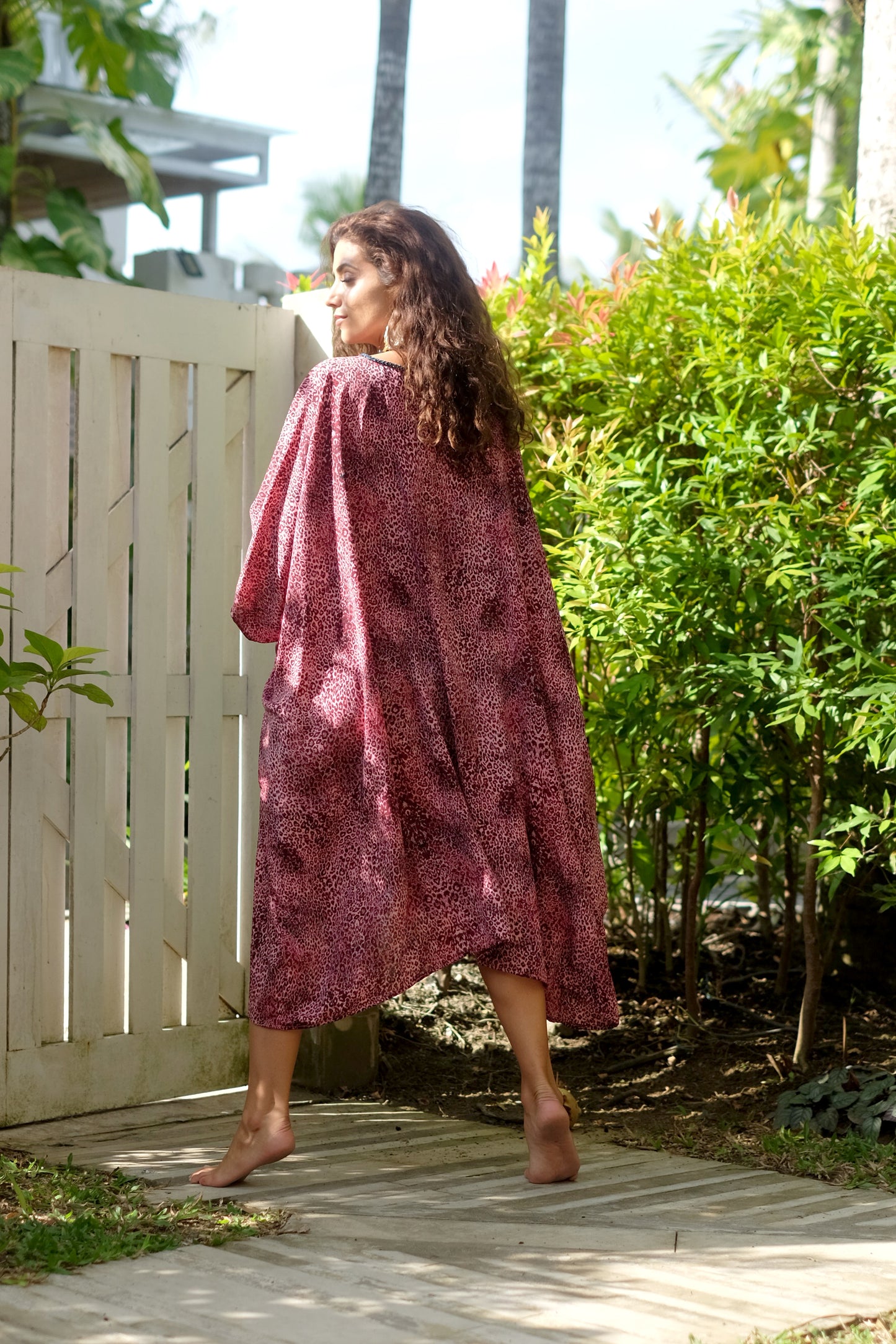 Sustainable & modern leopard print beach kaftan swimsuit cover-up, handmade in Bali, perfect for Dubai resorts.