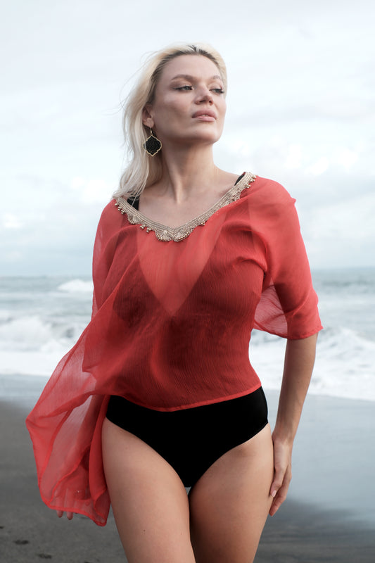 Women's sheer burnt orange beach kaftan in chiffon, perfect for Dubai beaches & resorts