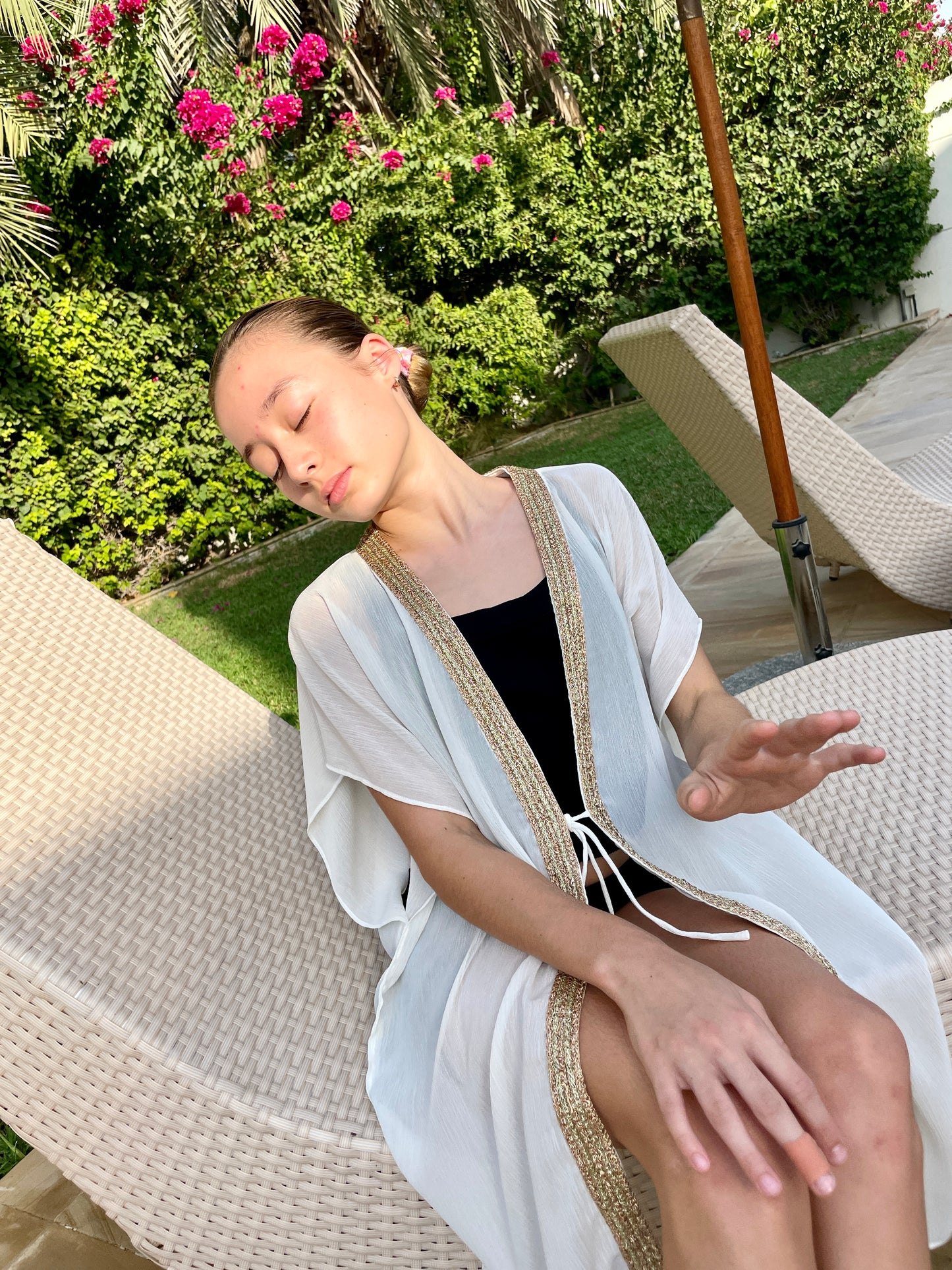 Slow-made white tween girls kaftan with gold beaded neckline, breathable and sustainable beachwear in Dubai