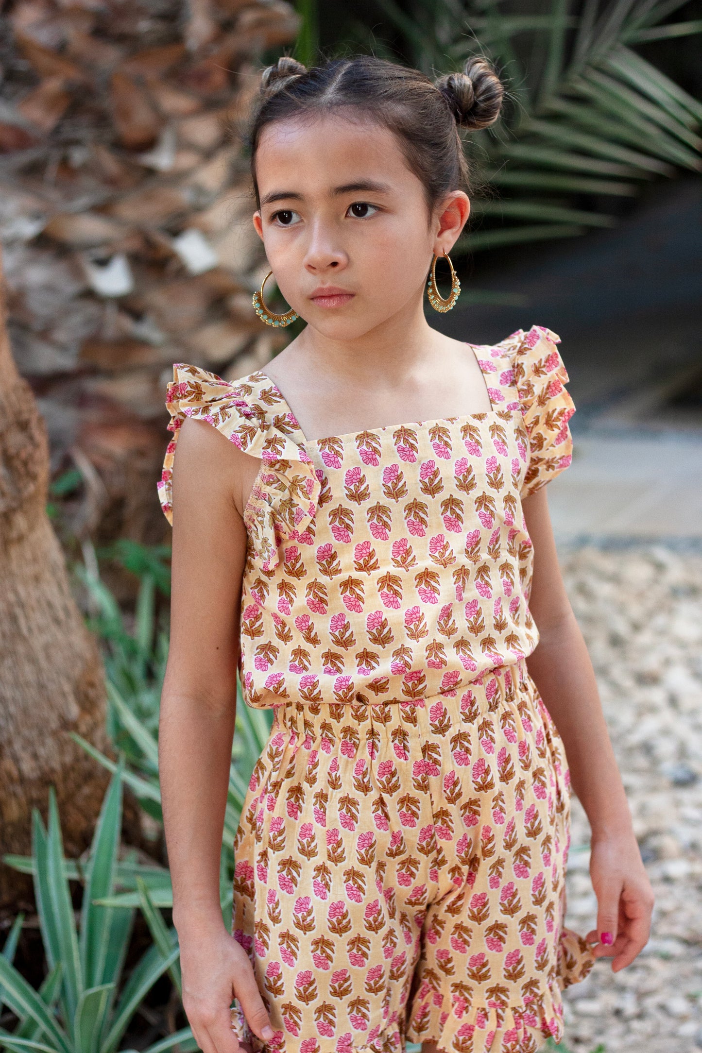 Sustainable girls outfit for beach and resort wear with fluttery sleeves and shorts for Dubai outings
