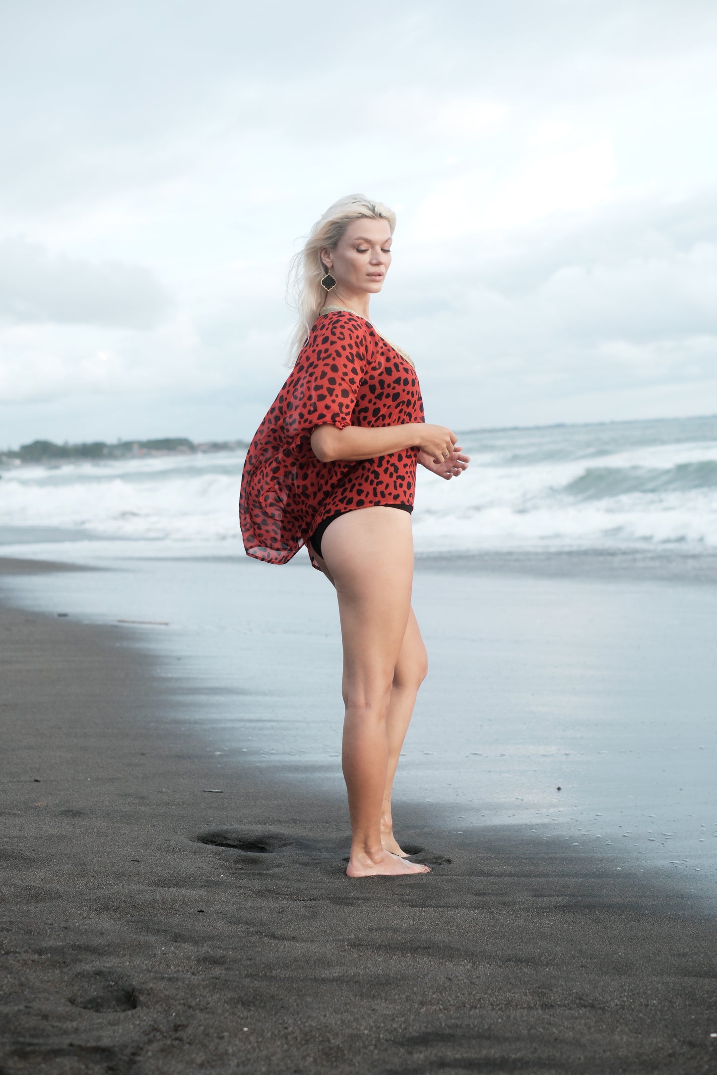 Ethical & sustainable beachwear kaftan top with red leopard print chiffon and gold neckline trim.