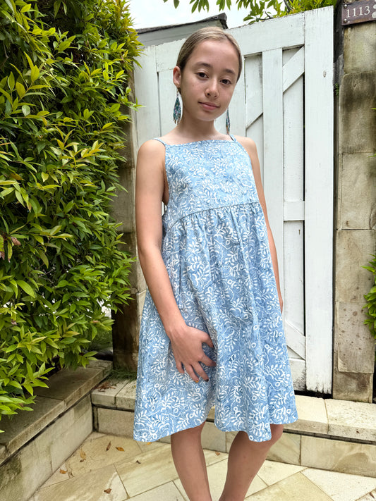 Handmade Indonesian batik cotton dress for kids in blue and white floral print, sustainable kids dress from Bali for girls in Dubai