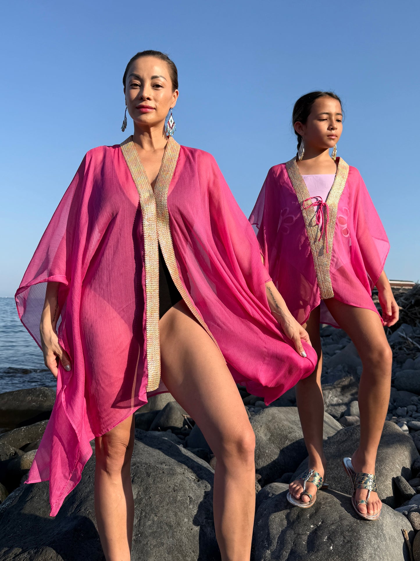 Mommy and daughter hot pink beach kaftans, sustainable Bali resort wear made for fashionistas in Dubai