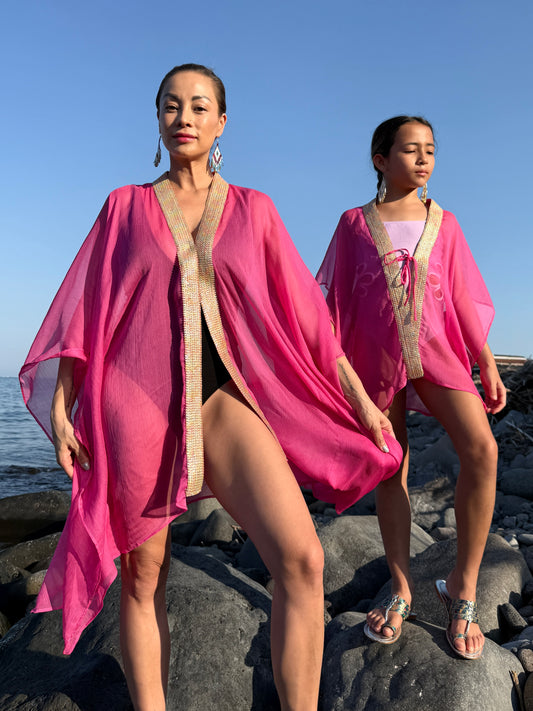 Mommy and daughter hot pink beach kaftans, sustainable Bali resort wear made for fashionistas in Dubai