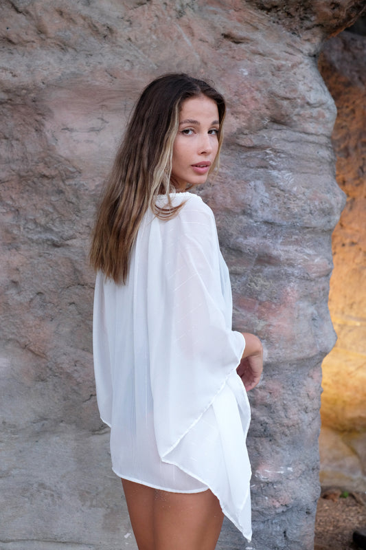 Orla white lurex women's beach kaftan with bead details, stylish and eco-friendly swimsuit cover ups and resort wear for women in Dubai