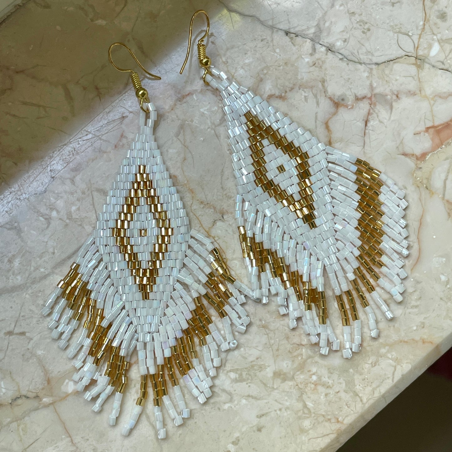Bali artisan white and gold statement earrings, maxi size for Dubai shoppers