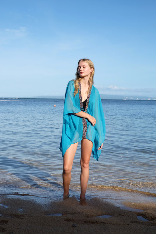 Luxury turquoise crepe chiffon kaftan cover-up for beach and resort wear for women looking for unique beach kaftans in Dubai