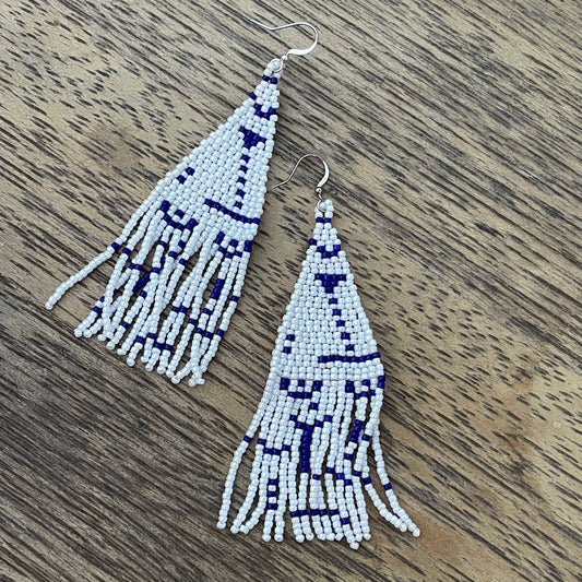 Handmade white and blue beaded dangle earrings from Bali, sustainable fashion accessory for women in Dubai