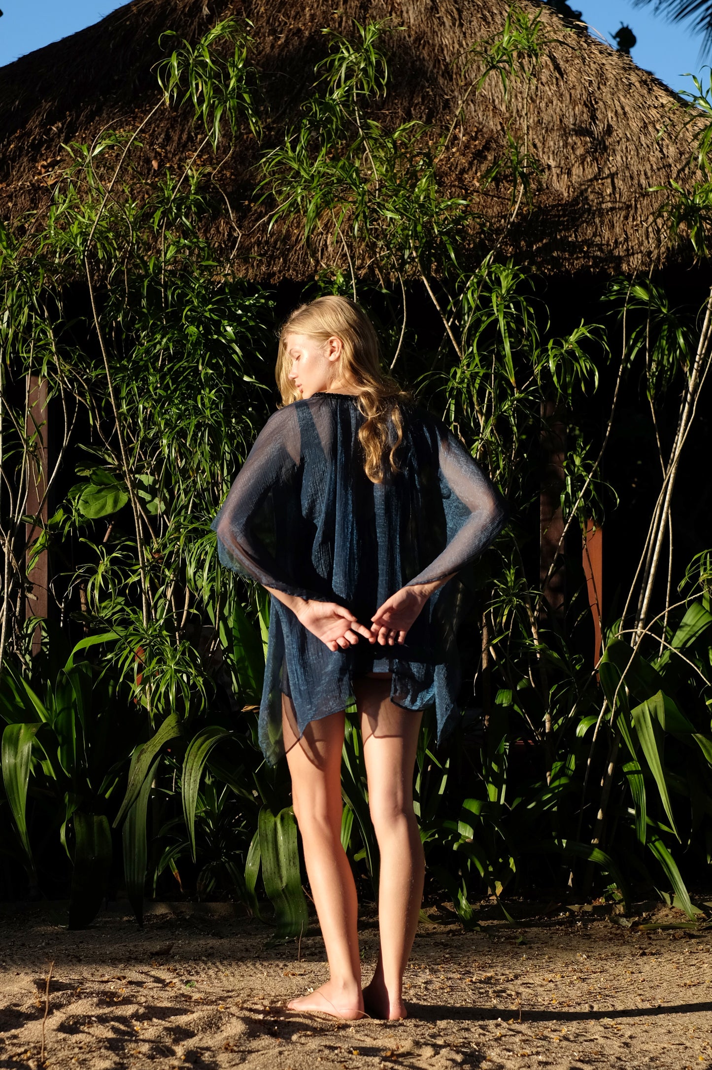 Sustainable Shani V-Neck Teal Kaftan with black bead detail, resort wear made in Bali, available online in Dubai.