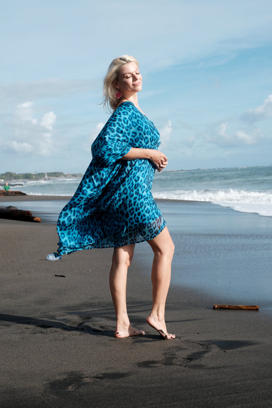 Blue leopard print silk kaftan by Vin and Min, ethical resort wear Dubai