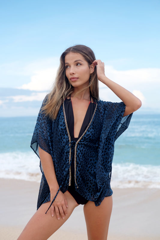 Luxury resort kaftan in teal leopard print for petite women in Dubai looking for best resort wear and modern beach kaftans
