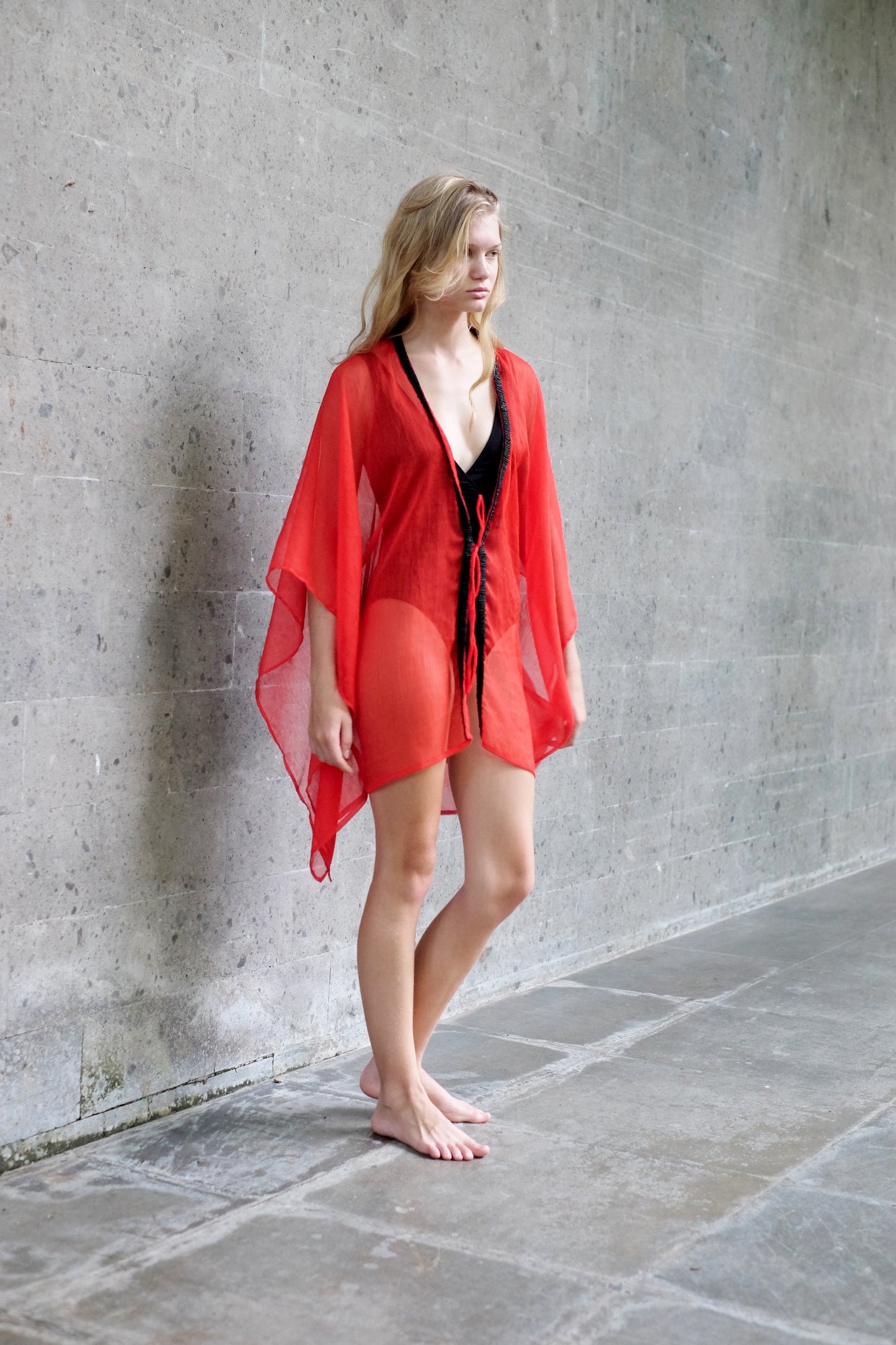 Hand-embroidered red kaftan & beach cover-up, perfect for summer vacations and beachside glamour in Dubai
