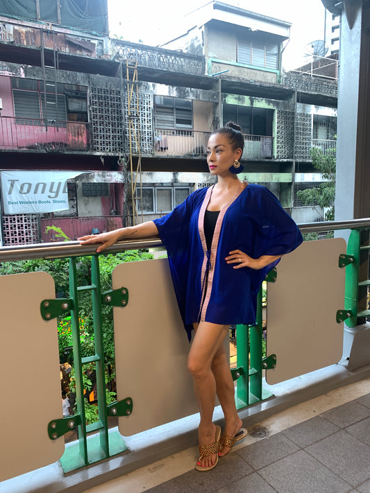 Royal blue women's beach cover-up with rose gold and purple saree trim, perfect for Dubai beach days or city adventures