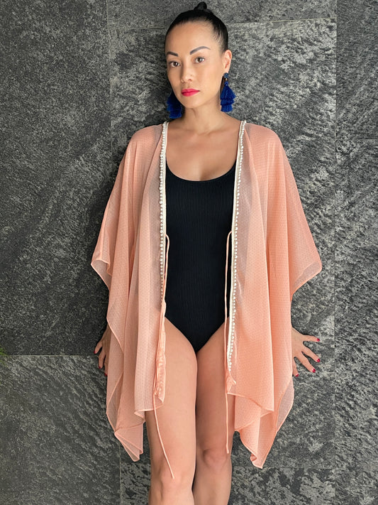 Flowy crepe chiffon beach cover-up in light orange with beaded neckline
