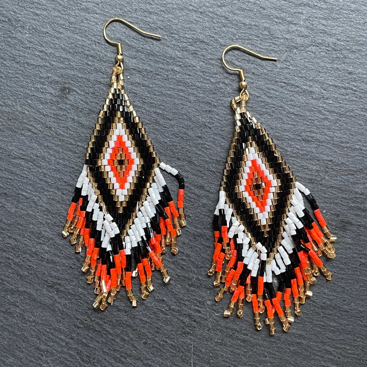 Bali artisan black and orange statement earrings, midi size for women in UAE