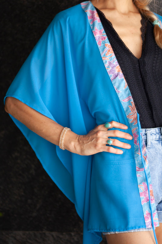 Utama women's beach kaftan in ocean blue chiffon with handcrafted batik trim – artisanal and stylish for women in Dubai