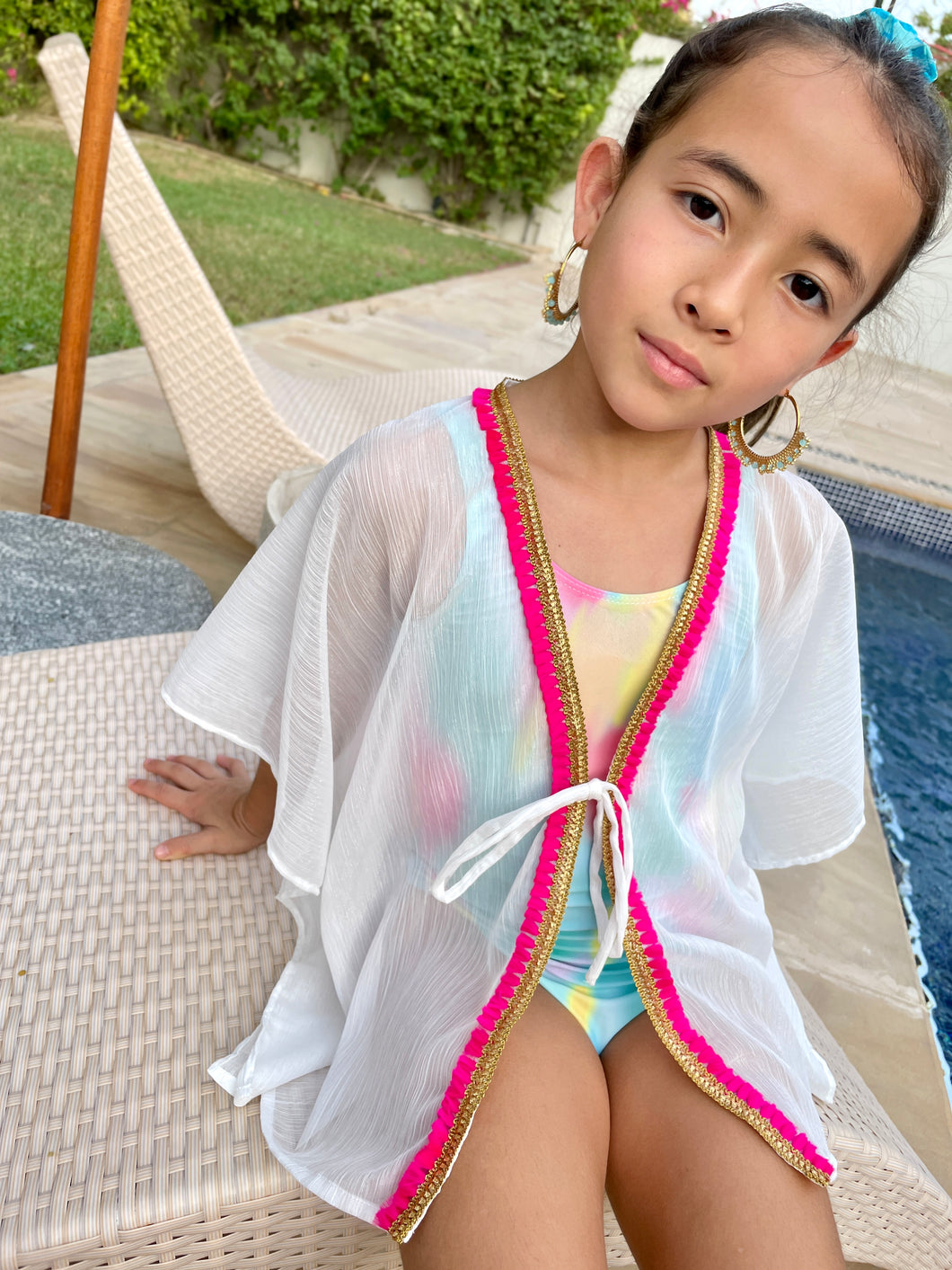 Girls kids white beach kaftan swimsuit cover up with hot pink tassel trim for the pool and the beach