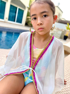 Girls kids white beach kaftan swimsuit cover up with purple tassel trim for the pool and the beach