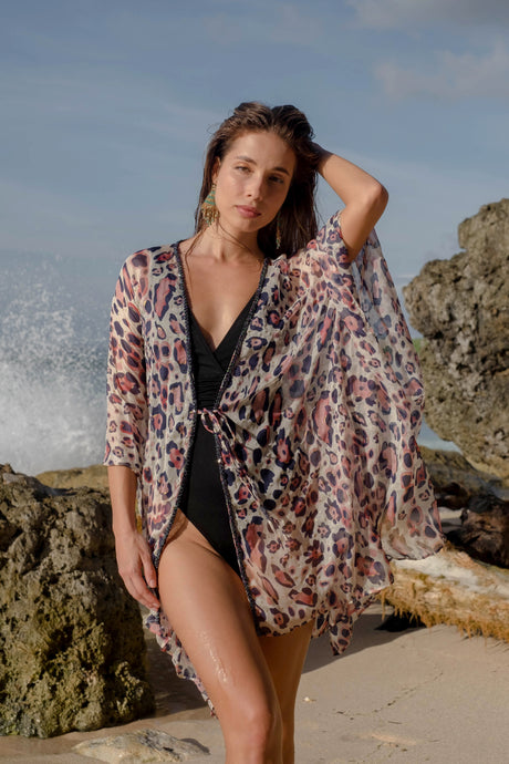 Front view of the Alina navy leopard print silk chiffon beach kaftan coverup, perfect resort wear kaftan for the pool & beach in Dubai