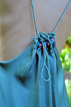 Load image into Gallery viewer, Back close up view of bead and pleat details on the Angel maxi halter dress with adjustable ties ensuring a perfect fit for fashion lovers in Dubai looking for resort wear dresses