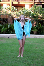 Load image into Gallery viewer, Handcrafted luxury women&#39;s beach kaftan for Dubai’s beach and resort fashion scene, sustainably made resort wear from Bali
