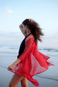 Red shimmer beach kaftan & swimwear cover-up with intricate beadwork – perfect for summer vacations and poolside lounging. Sustainable resort wear from Bali for women looking for best beach kaftans in Dubai
