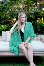 Load image into Gallery viewer, Relaxed-fit green beach kaftan for women in Dubai with intricate beadwork along the neckline. Sustainable resort kaftan from Bali for sale in Dubai
