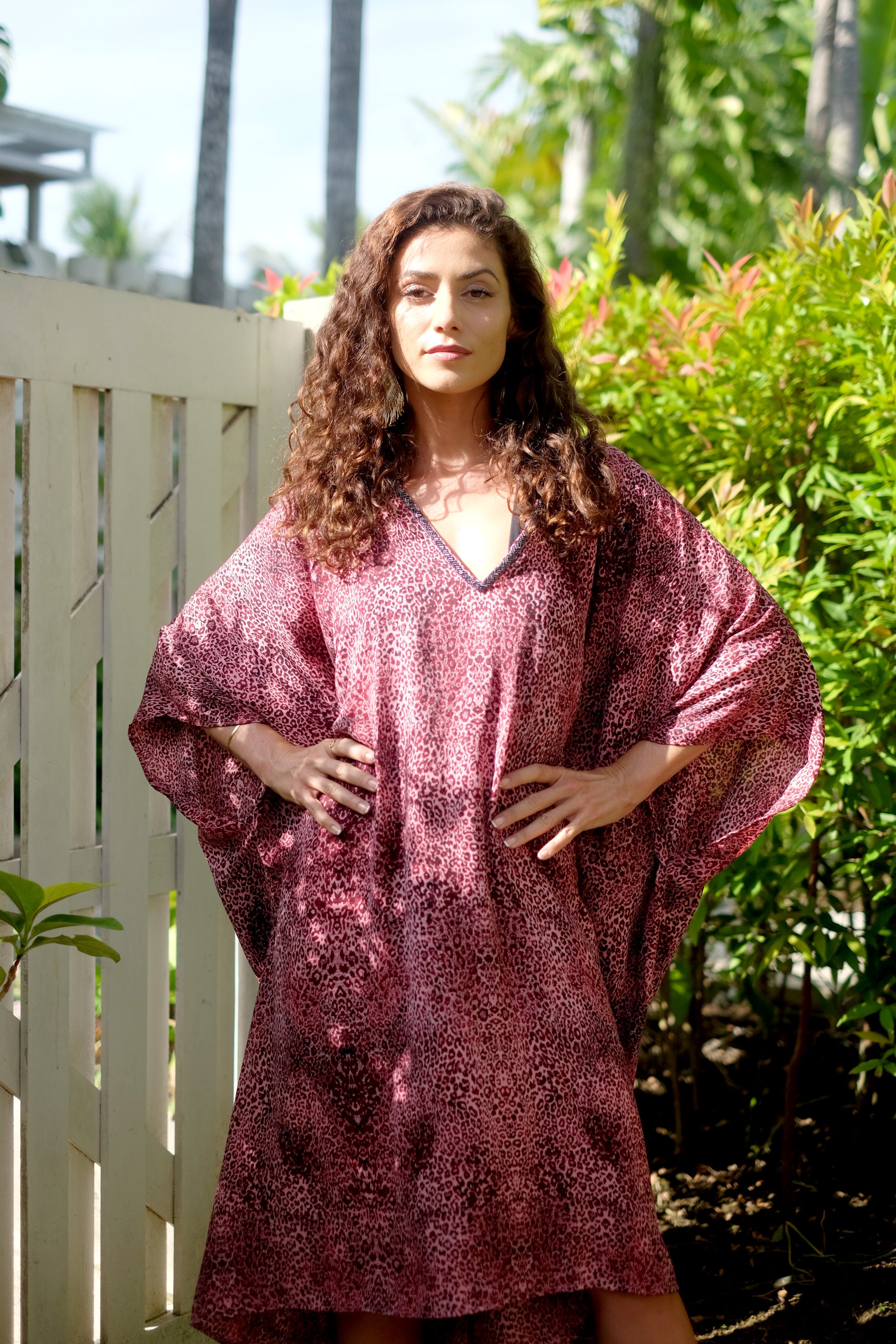 Elegant berry pink leopard print beach cover-up kaftan dress, hand-sewn metallic beads, sustainably made in Bali for women in Dubai