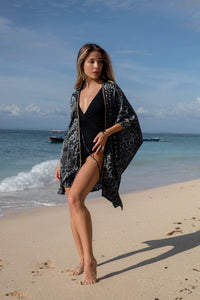 Fierce green leopard print beach kaftan for a glamorous & luxurious beach look at Dubai's beaches & beach clubs
