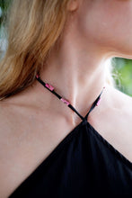 Load image into Gallery viewer, Close-up of the intricate beadwork along the neckline of the Mimi black halter dress, adding a touch of elegance.
