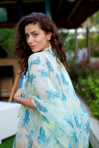 Side view of the Misu beach kaftan with bead-trimmed neckline, sustainably made resort wear from Bali for women looking where to buy kaftan in dubai
