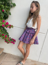 Load image into Gallery viewer, Girl wearing the Rory top as a skirt, this top can be worn 2 ways, made from hand-stamped Indonesian batik, sustainably made in Bali