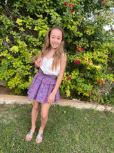 Load image into Gallery viewer, Full length photo of girl wearing the Rory top as a skirt, this top can be worn 2 ways, made from hand-stamped Indonesian batik, sustainably made in Bali, available in Dubai