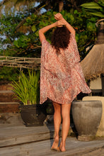 Load image into Gallery viewer, Back view of the Salila pink leopard print kaftan for women, made from silk chiffon, with rhinestone neckline trim, sustainable resort wear for women made in Bali for Dubai beach lovers &amp; fashionistas