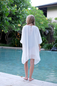 Back view of the Seraphina multiway kaftan, transformed into a halter dress, highlighting its stylish versatility, perfect for fashionable women in Dubai, sustainably made in Bali