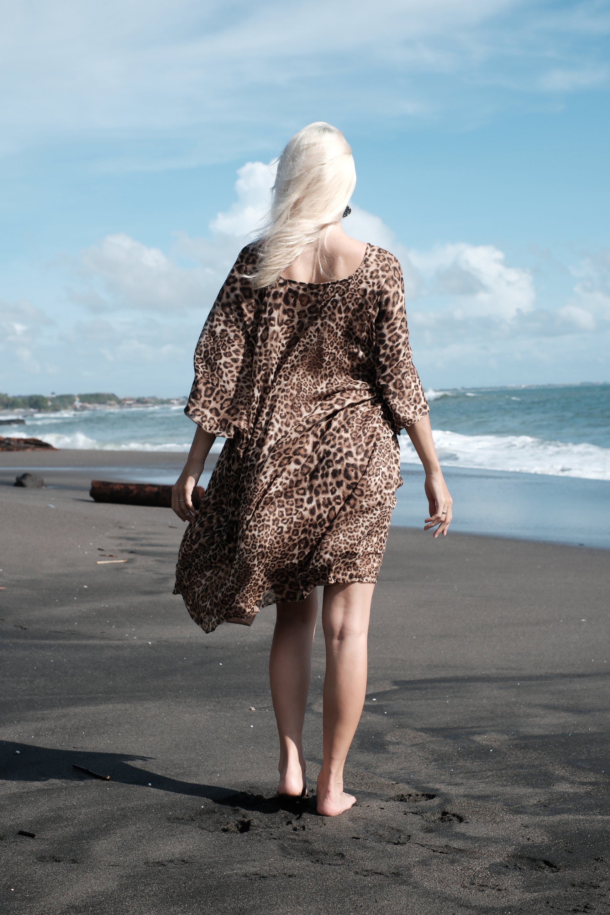 Back view of Seraphina flowing animal print kaftan for beach, yacht, or city wear, sustainable fashion made in Bali