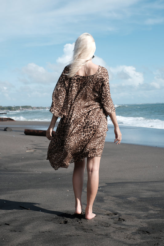Back view of Seraphina flowing animal print kaftan for beach, yacht, or city wear, sustainable fashion made in Bali