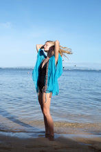 Load image into Gallery viewer, Turquoise beach kaftan with multi-colored handsewn beaded neckline embellishment for women looking for the best beach kaftans in Dubai