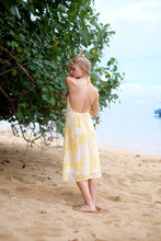 Load image into Gallery viewer, Back view of Mimi lightweight crepe chiffon yellow floral beach dress with low back, neck ties, adjustable waist, and a flowing silhouette, perfect for chill afternoons in Dubai.
