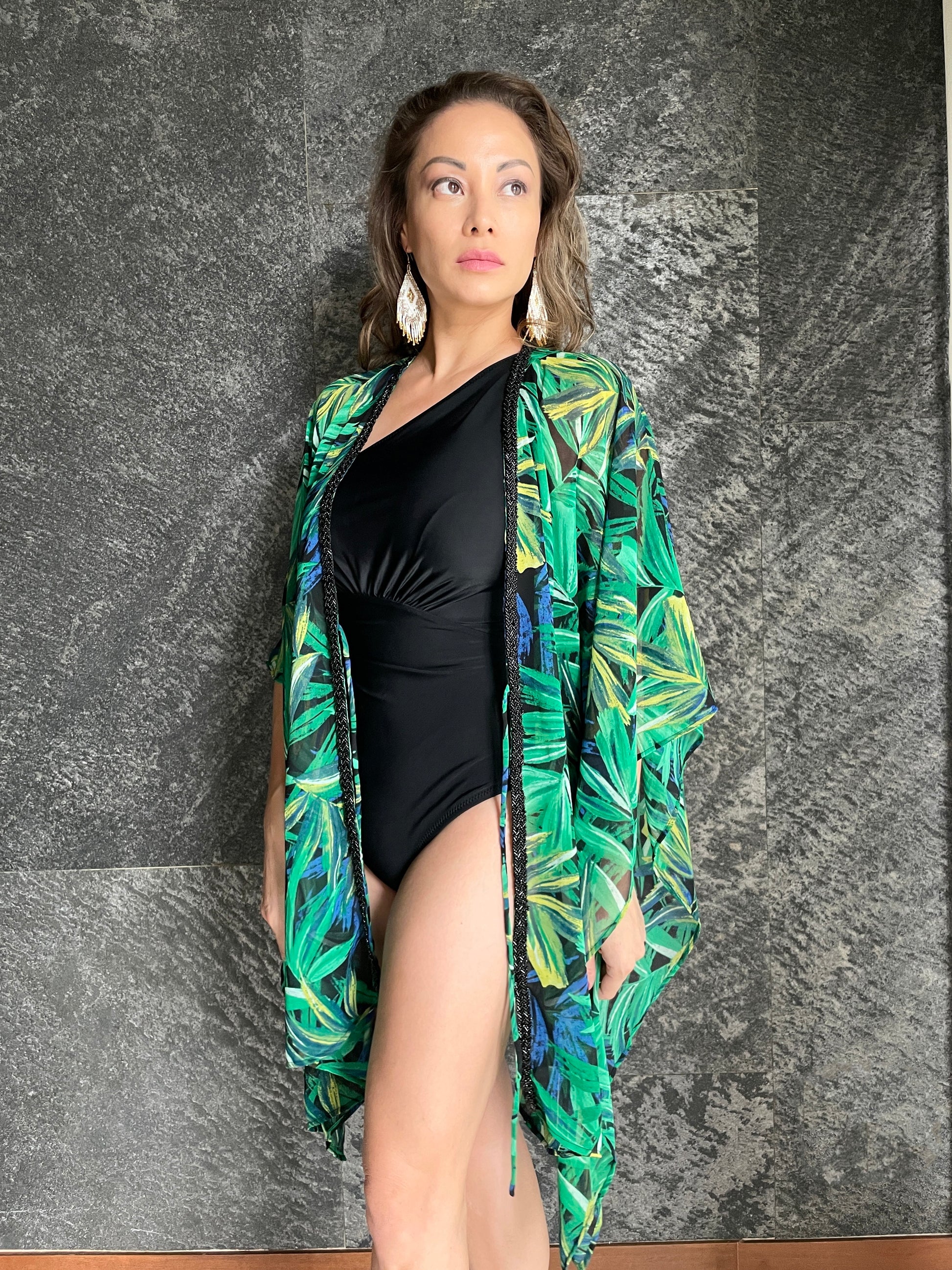 green tropical beach kaftan with palm print and black bead trim, front view, resortwear for women in dubai