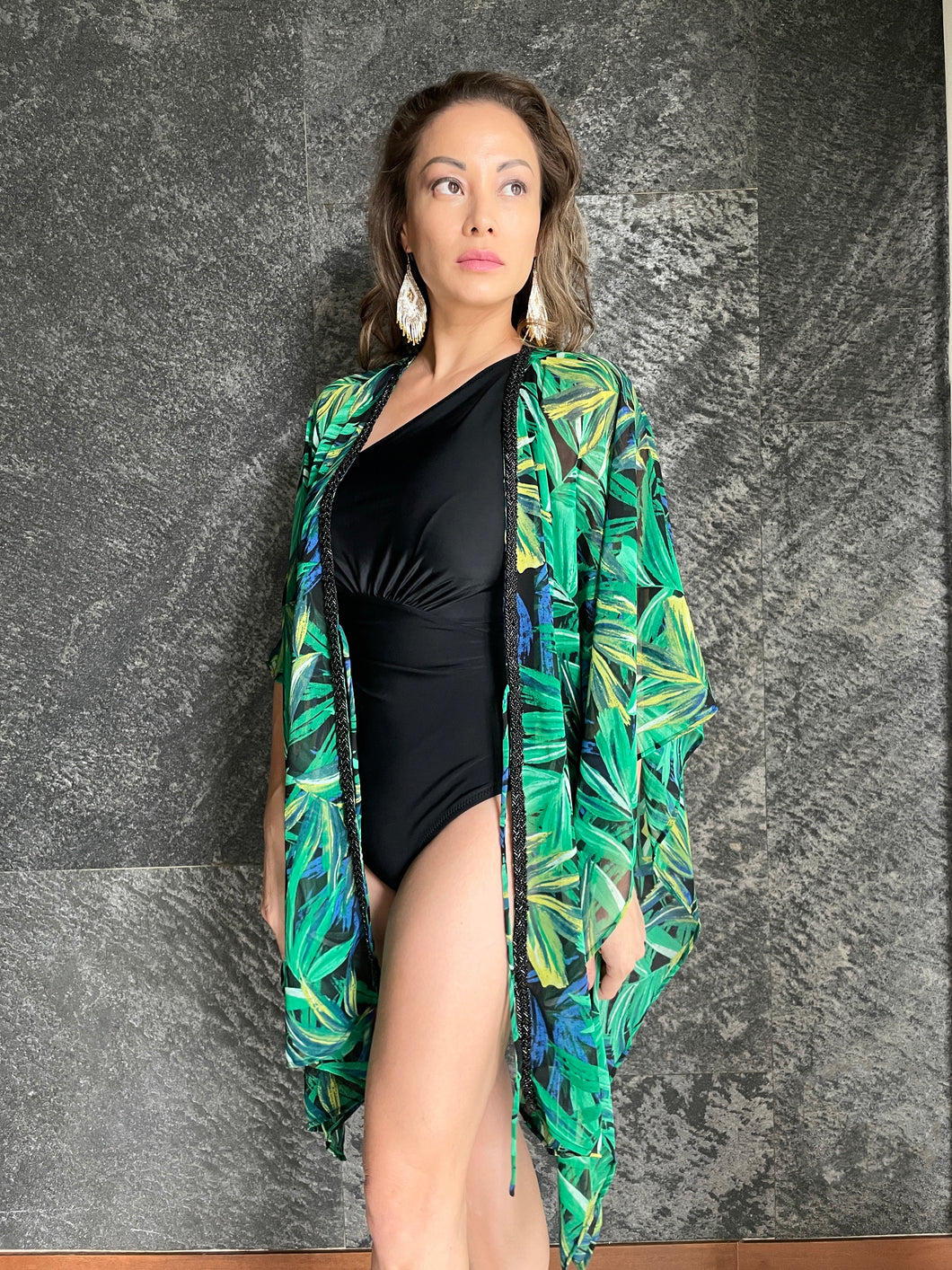 green tropical beach kaftan with palm print and black bead trim, front view, resortwear for women in dubai